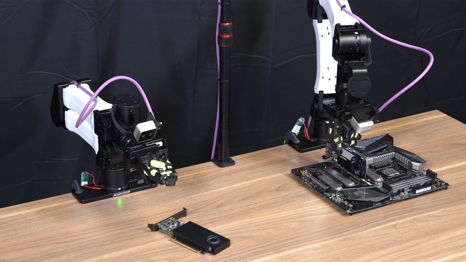 Reference image for: Nvidia reveals AI robots that taught themselves to install GPUs into motherboards